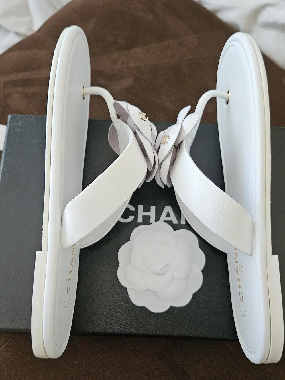 CHANEL White Camellia Leather Slide Sandals with Gold Eyelets